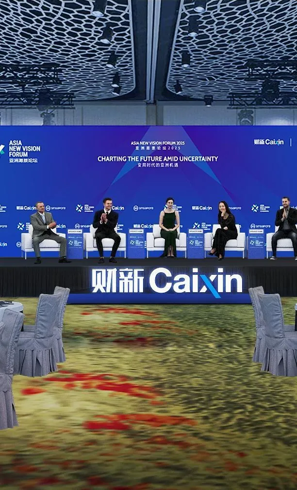 Asia New Vision Forum for Caixin Global — Built: the opening plenary in session, brand lock-up carried across the full backdrop width.