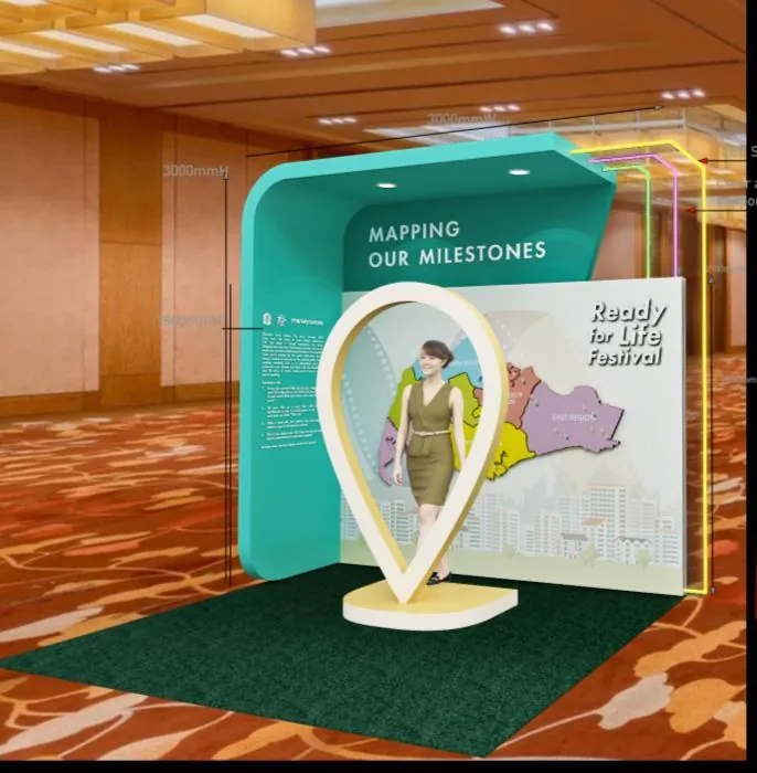 Ready For Life Festival for CPF Board & MoneySense — "Mapping Our Milestones" — the campaign pin device built at full height as a photo moment.